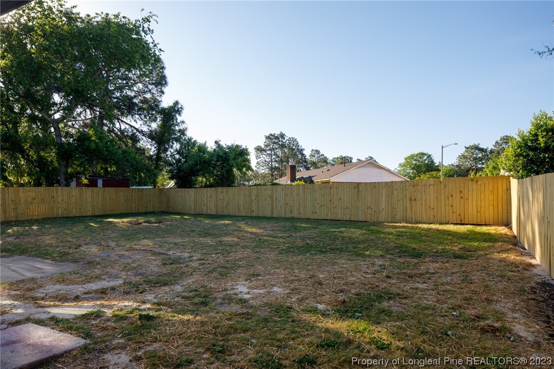 4514 Ruby Road Fayetteville, NC 28311 - Photo 20 of 21 a backyard of a house