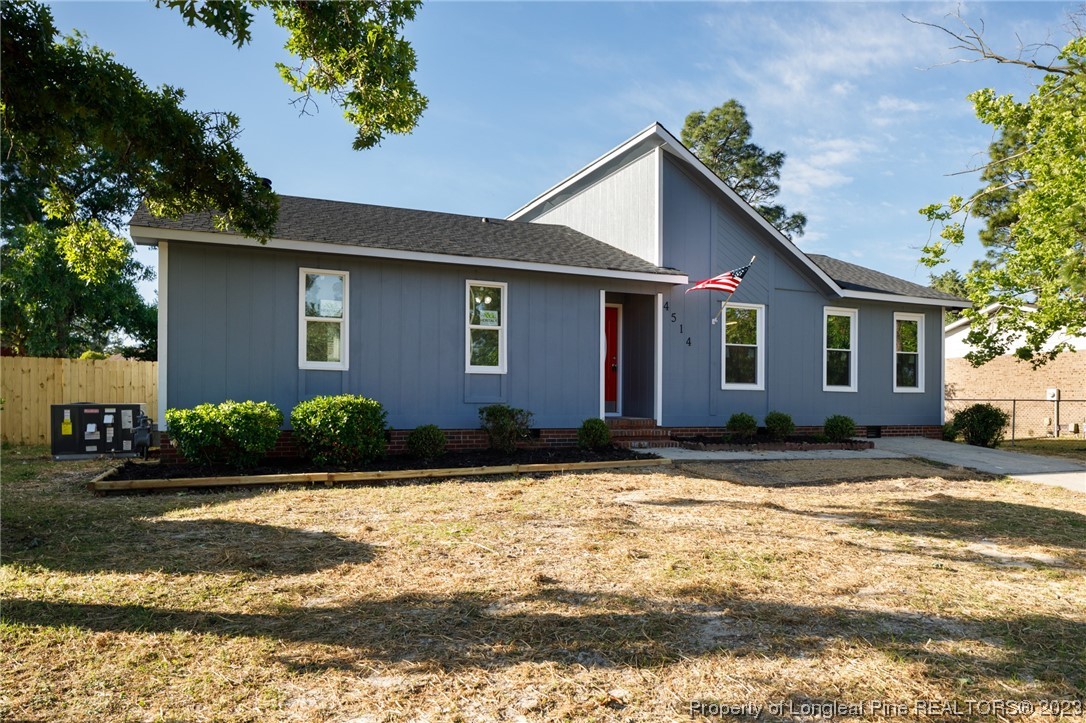 4514 Ruby Road Fayetteville, NC 28311 - Photo 2 of 21 a house that has a tree in front of it