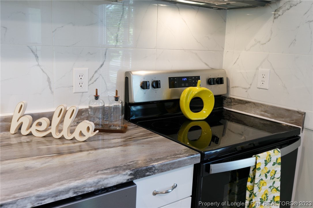 4514 Ruby Road Fayetteville, NC 28311 - Photo 8 of 21 a view of a kitchen counter space