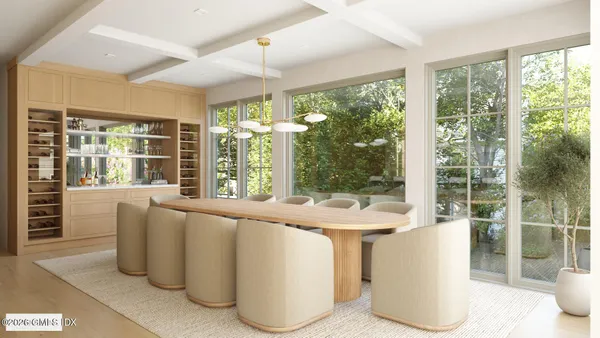 a living room with large windows