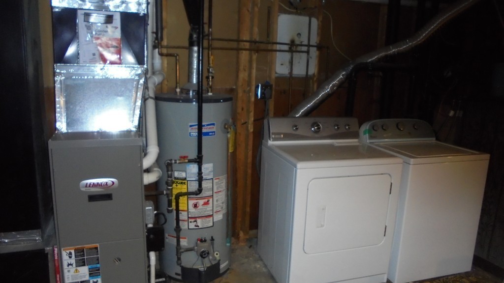 108 Wyman Road Billerica, MA 01821 - Photo 18 of 21 a utility room with dryer and washer