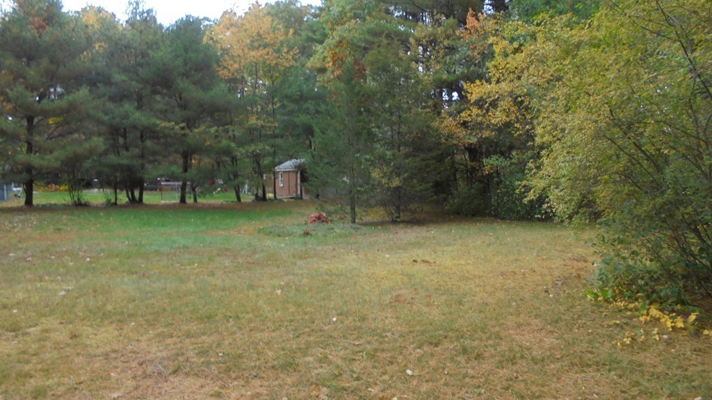 108 Wyman Road Billerica, MA 01821 - Photo 21 of 21 a view of a outdoor space with deck and tree