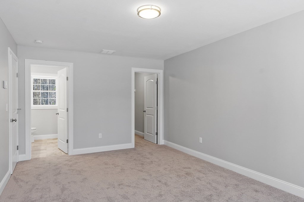 156 French Road, Unit LOT 5 Templeton, MA 01468 - Photo 28 of 39 an empty room with windows and closet