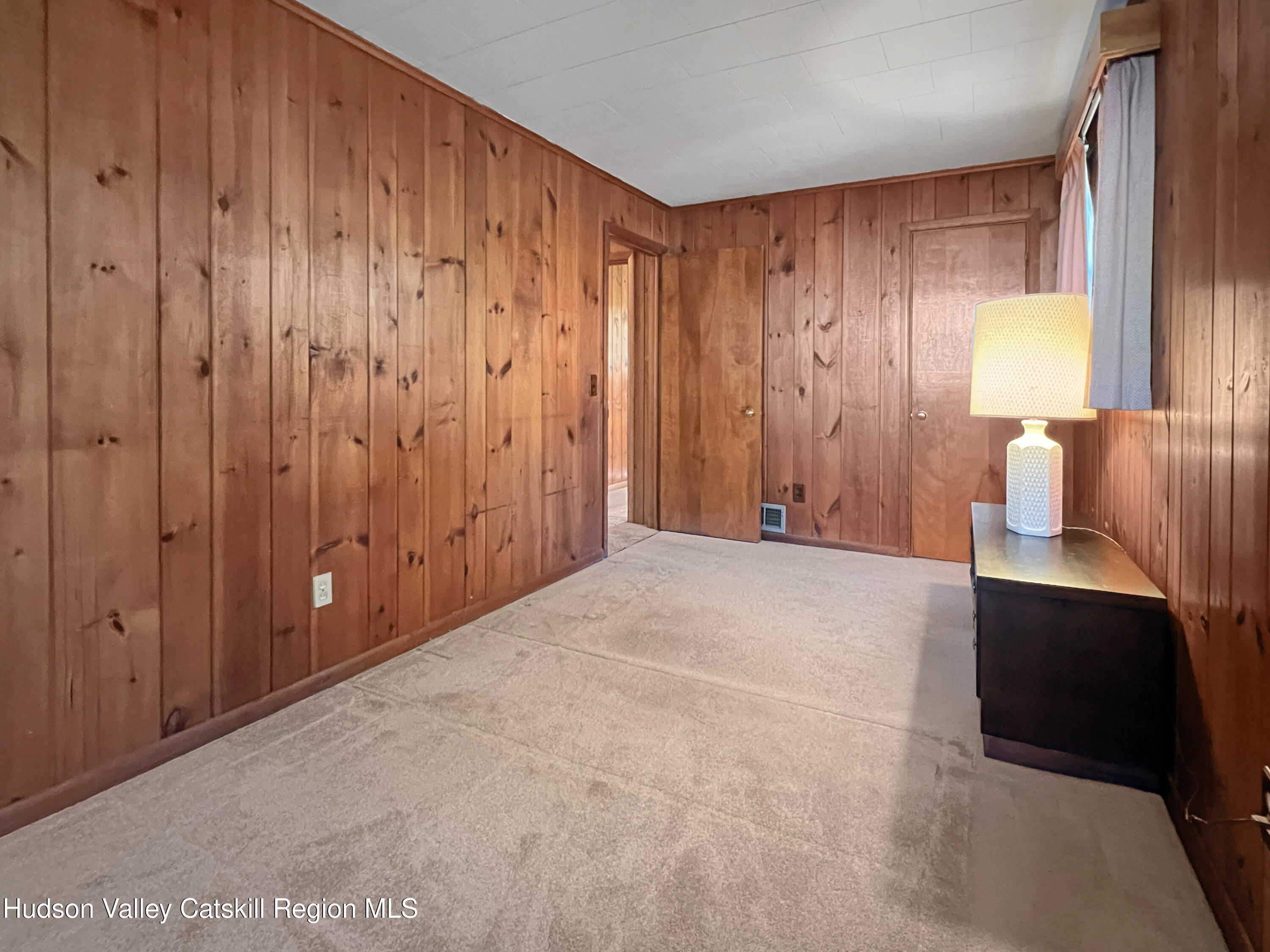 1076 Lakeview Road Copake, NY 12516 - Photo 11 of 19 a view of an empty room with a window