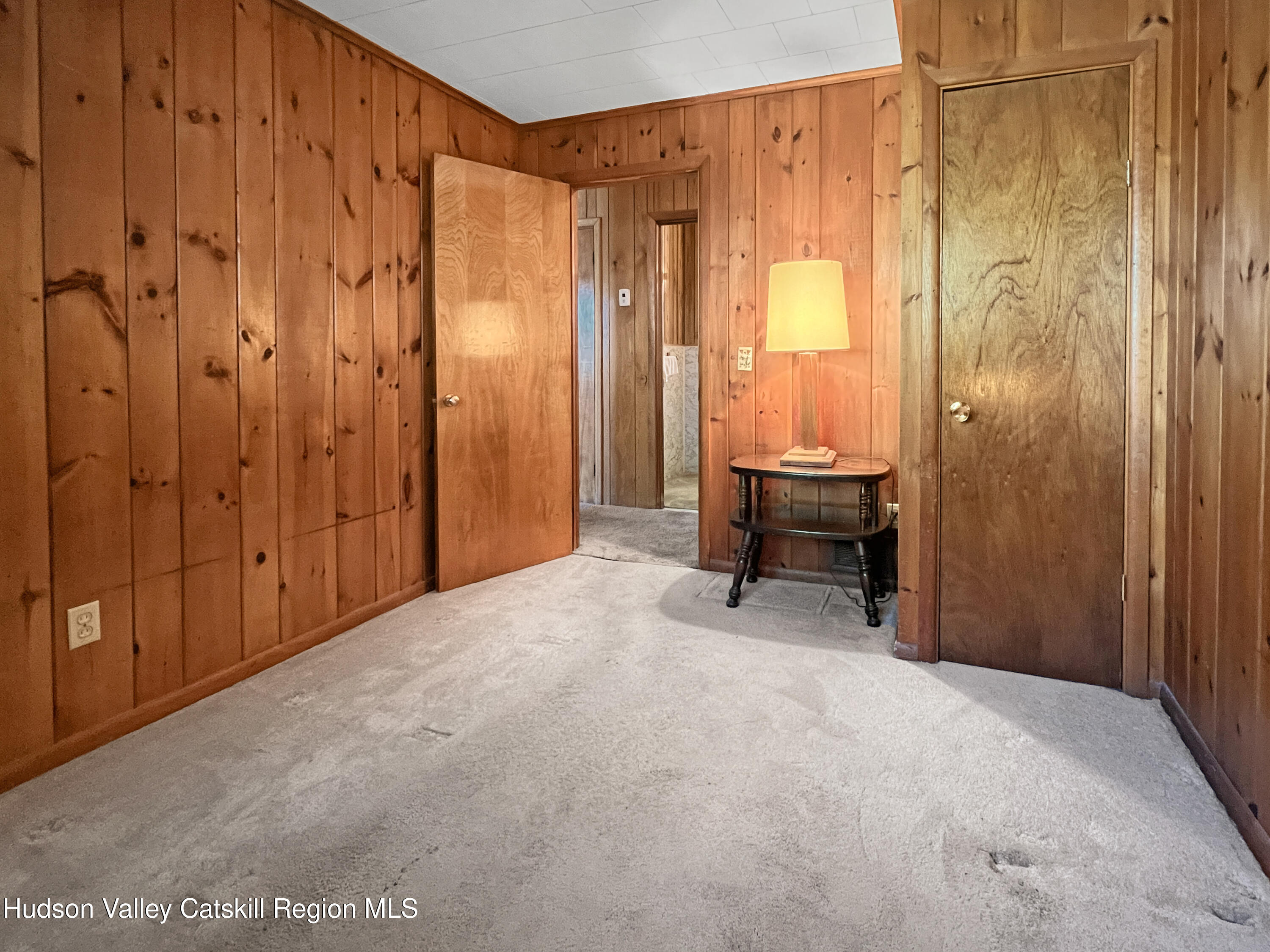 1076 Lakeview Road Copake, NY 12516 - Photo 15 of 19 a view of a room with large window and furniture