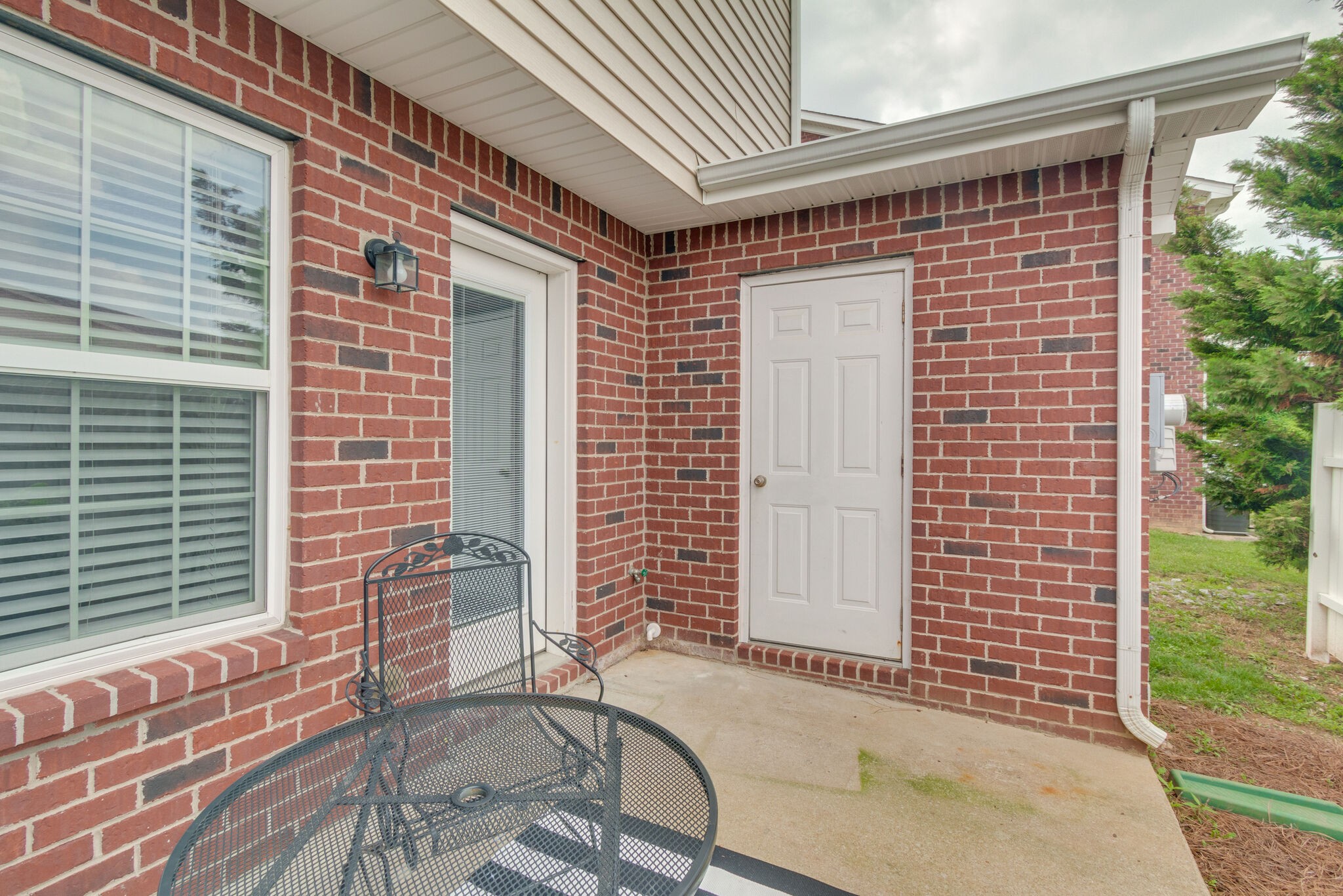4251 Aurora Circle Murfreesboro, TN 37127 - Photo 11 of 11 a front view of a house with a garden