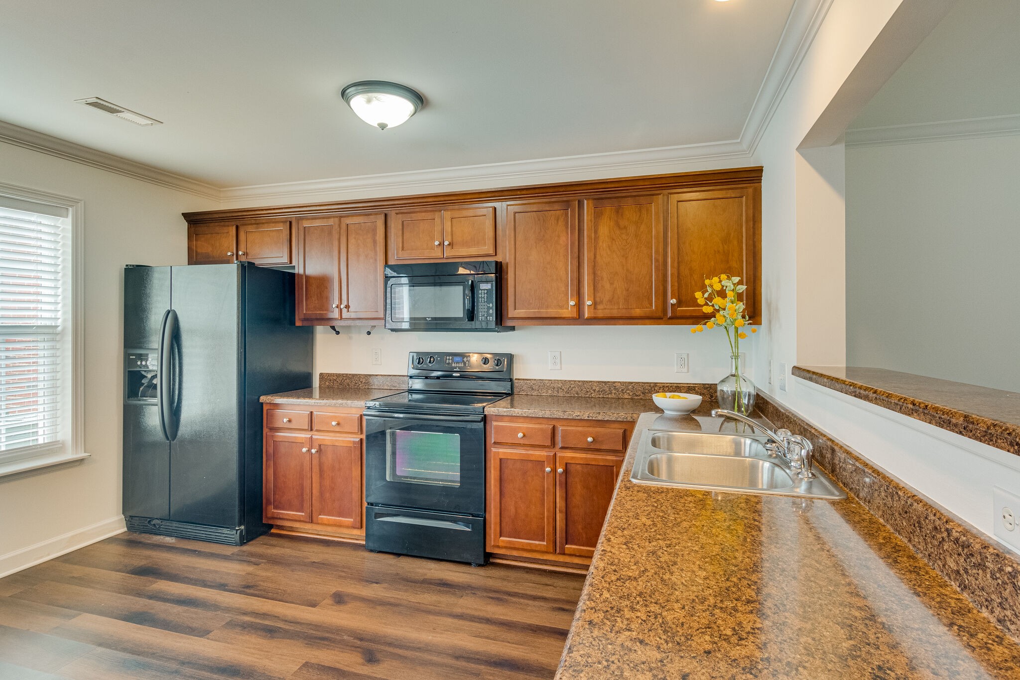 4251 Aurora Circle Murfreesboro, TN 37127 - Photo 5 of 11 a kitchen with stainless steel appliances granite countertop a refrigerator stove top oven and sink