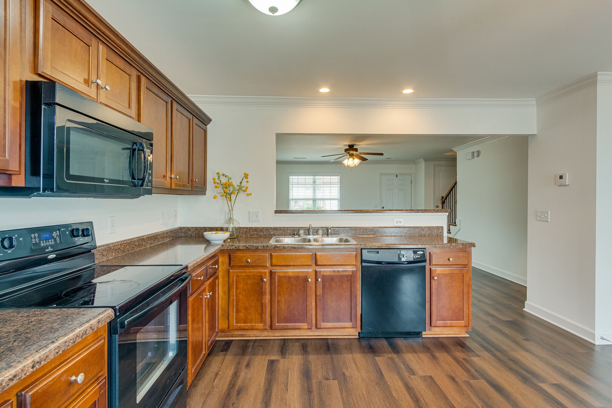 4251 Aurora Circle Murfreesboro, TN 37127 - Photo 6 of 11 a kitchen with stainless steel appliances granite countertop a sink stove and oven