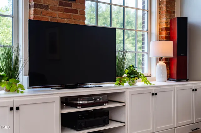 a living room with furniture and a table