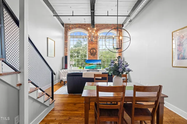 a kitchen with stainless steel appliances a microwave a stove and refrigerator