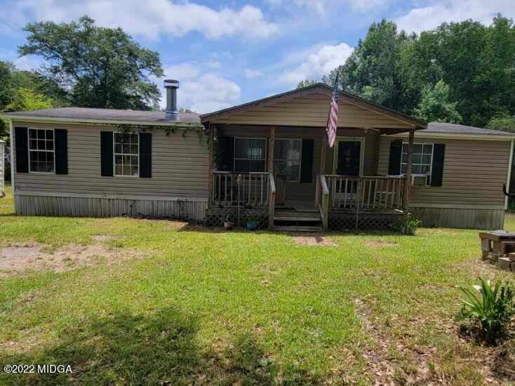 4460 Fulton Mill Road Macon, GA 31216 - Photo 1 of 23 a front view of house with yard