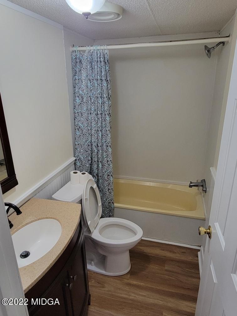 4460 Fulton Mill Road Macon, GA 31216 - Photo 19 of 23 a bathroom with a sink toilet and shower