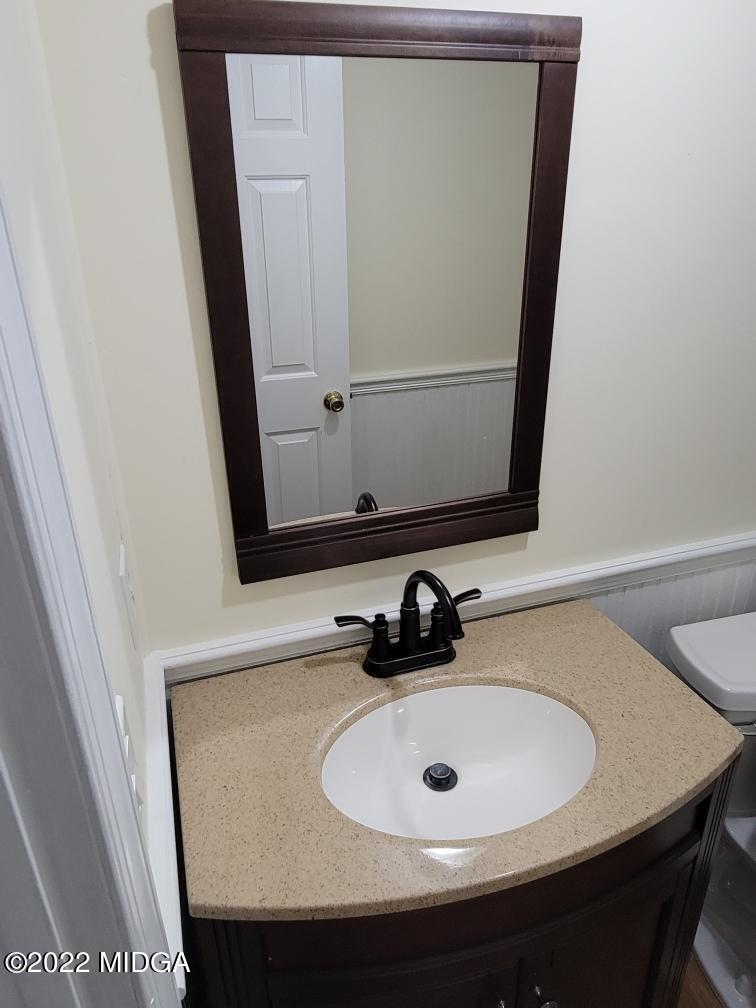 4460 Fulton Mill Road Macon, GA 31216 - Photo 21 of 23 a bathroom with a sink and a mirror