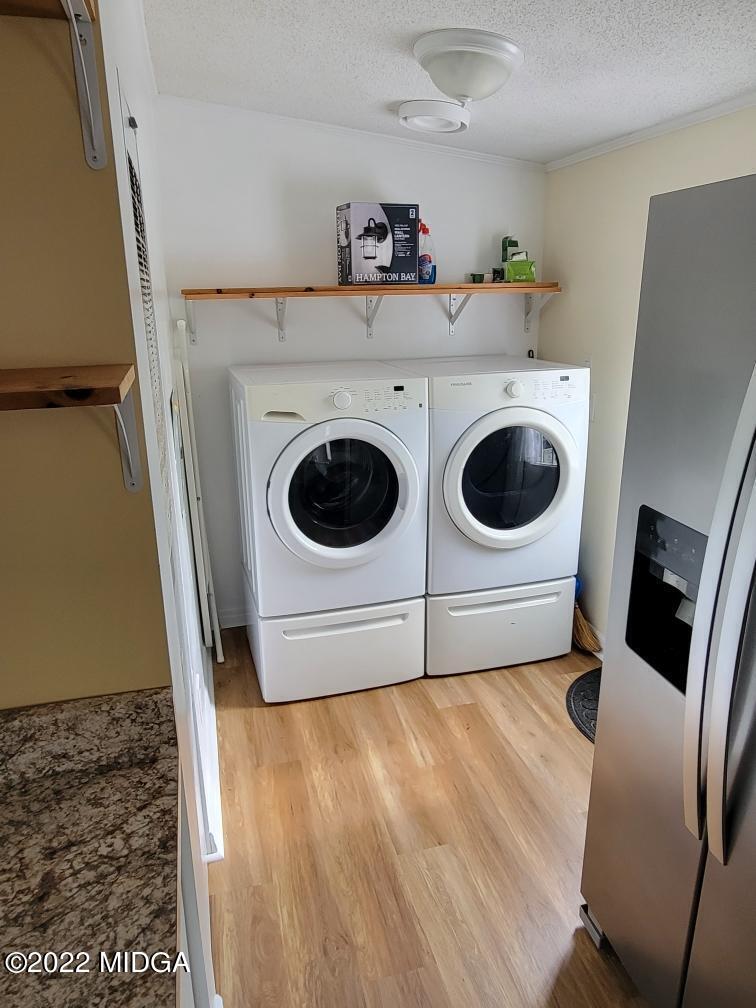 4460 Fulton Mill Road Macon, GA 31216 - Photo 10 of 23 a utility room with dryer and washer