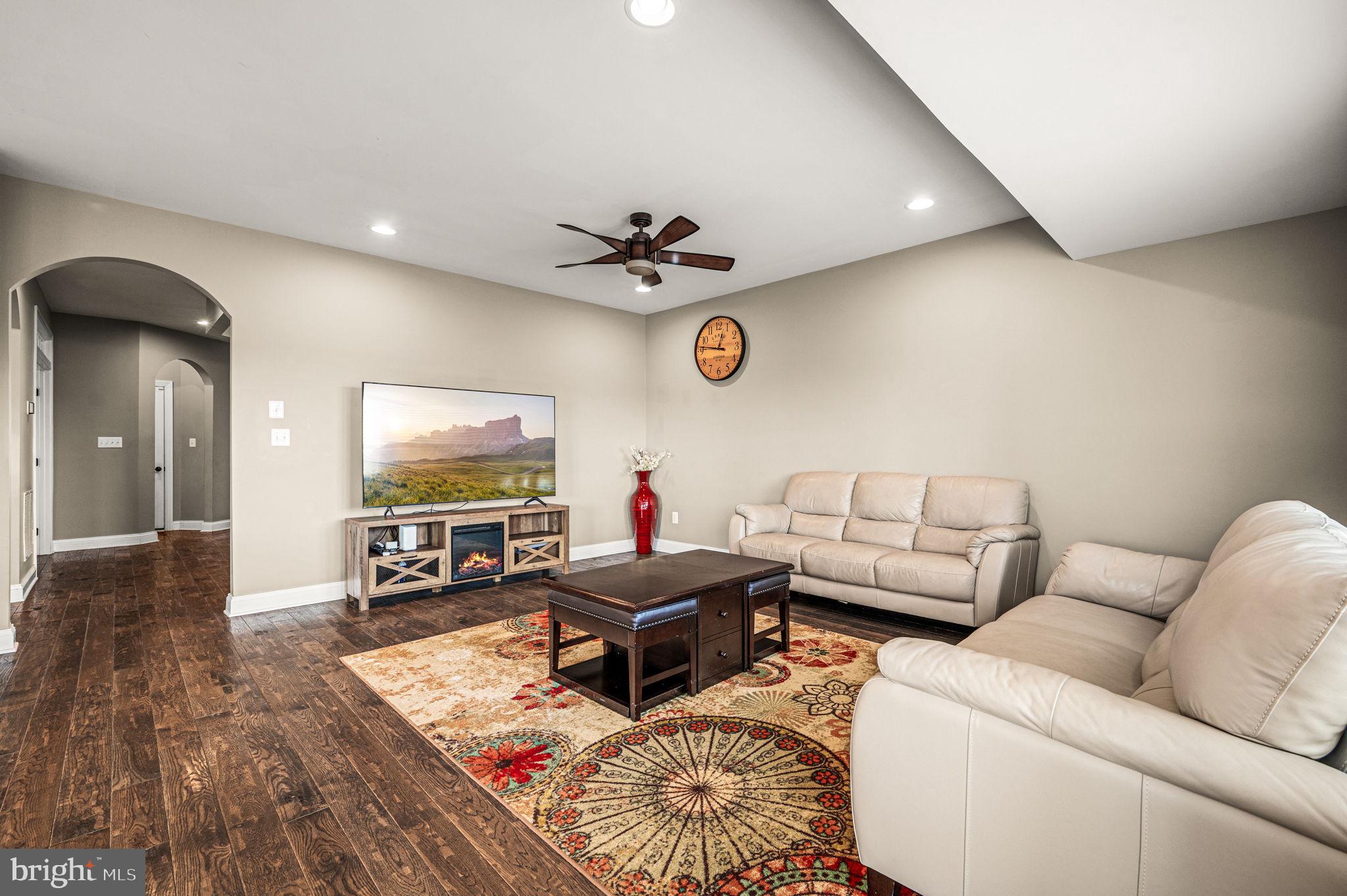 612 Quarry Point Road Malvern, PA 19355 - Photo 17 of 44 a living room with furniture and a flat screen tv