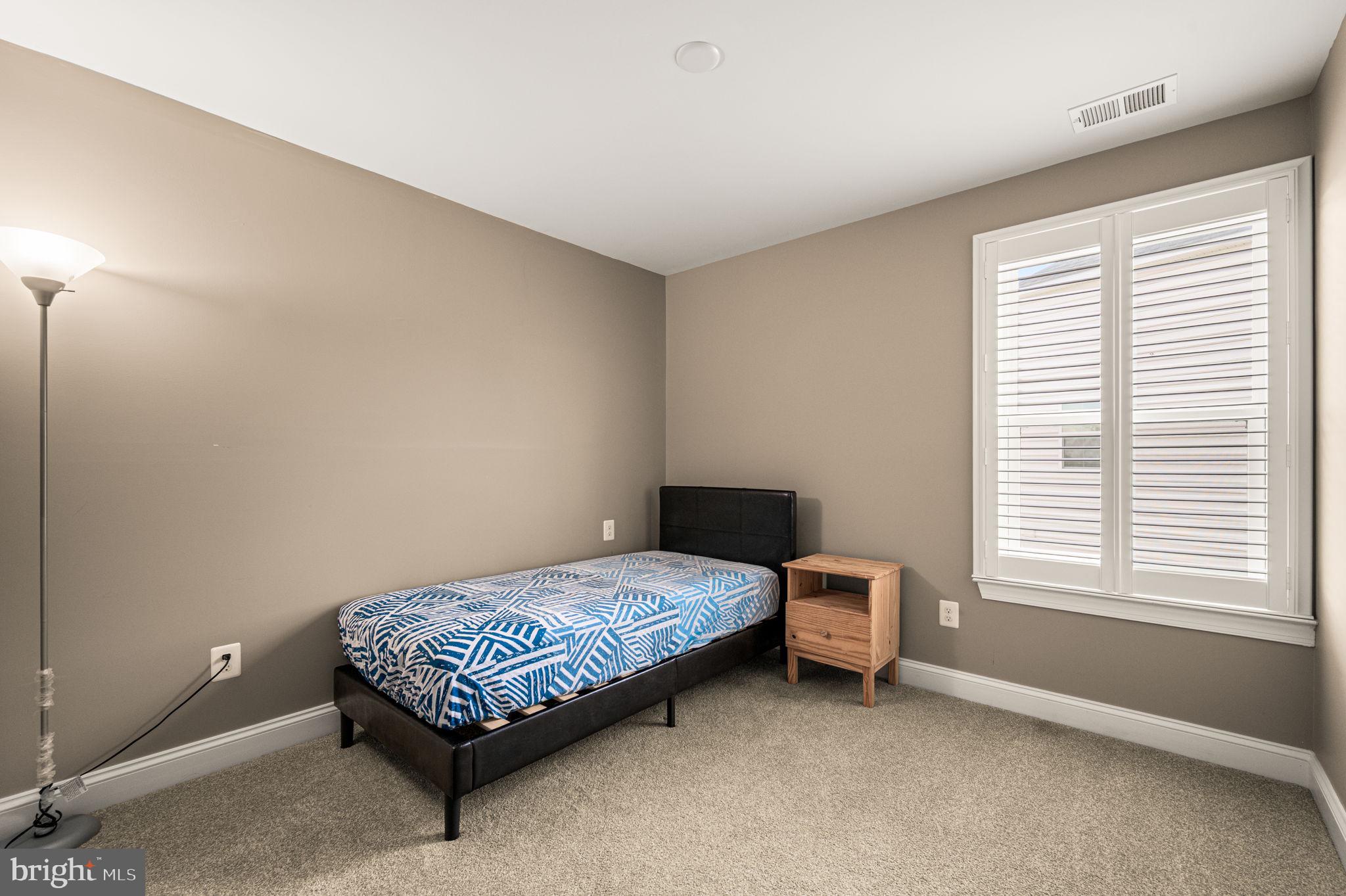 612 Quarry Point Road Malvern, PA 19355 - Photo 24 of 44 a bedroom with a bed and a window