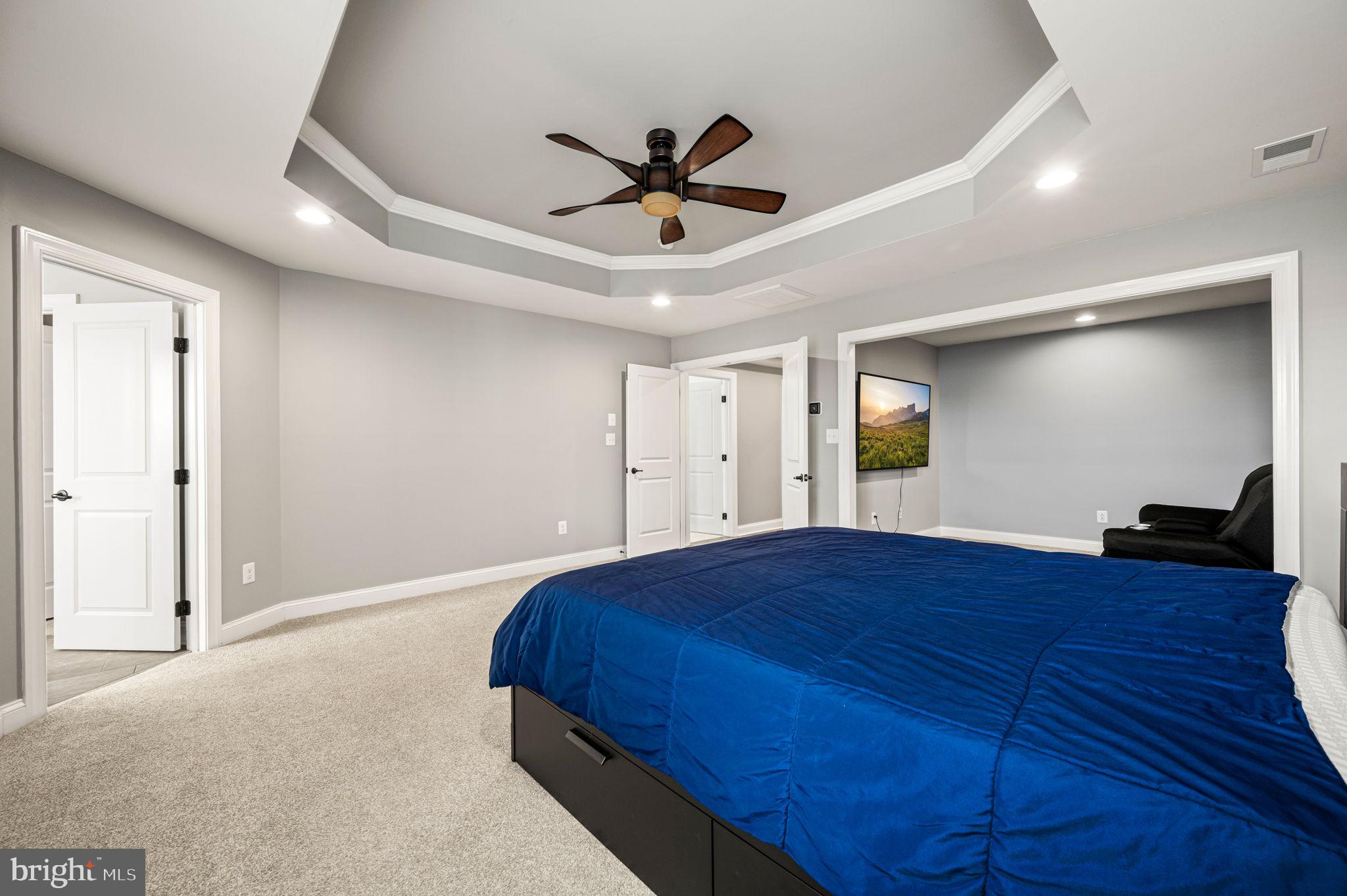 612 Quarry Point Road Malvern, PA 19355 - Photo 27 of 44 a bedroom with a bed and a ceiling fan