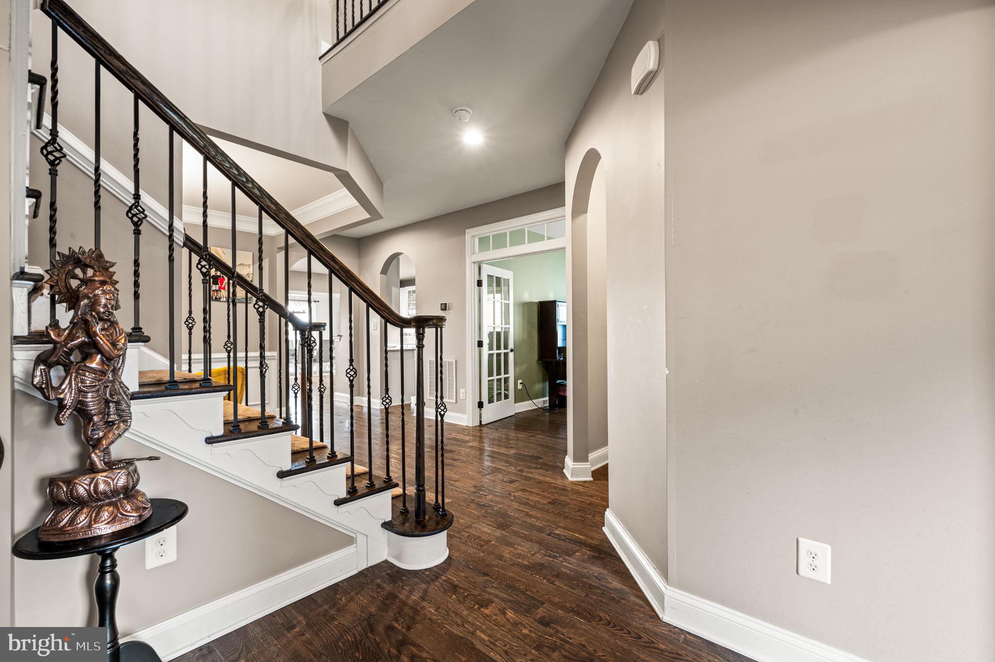 612 Quarry Point Road Malvern, PA 19355 - Photo 6 of 44 a view of entryway with livingroom and wooden floor