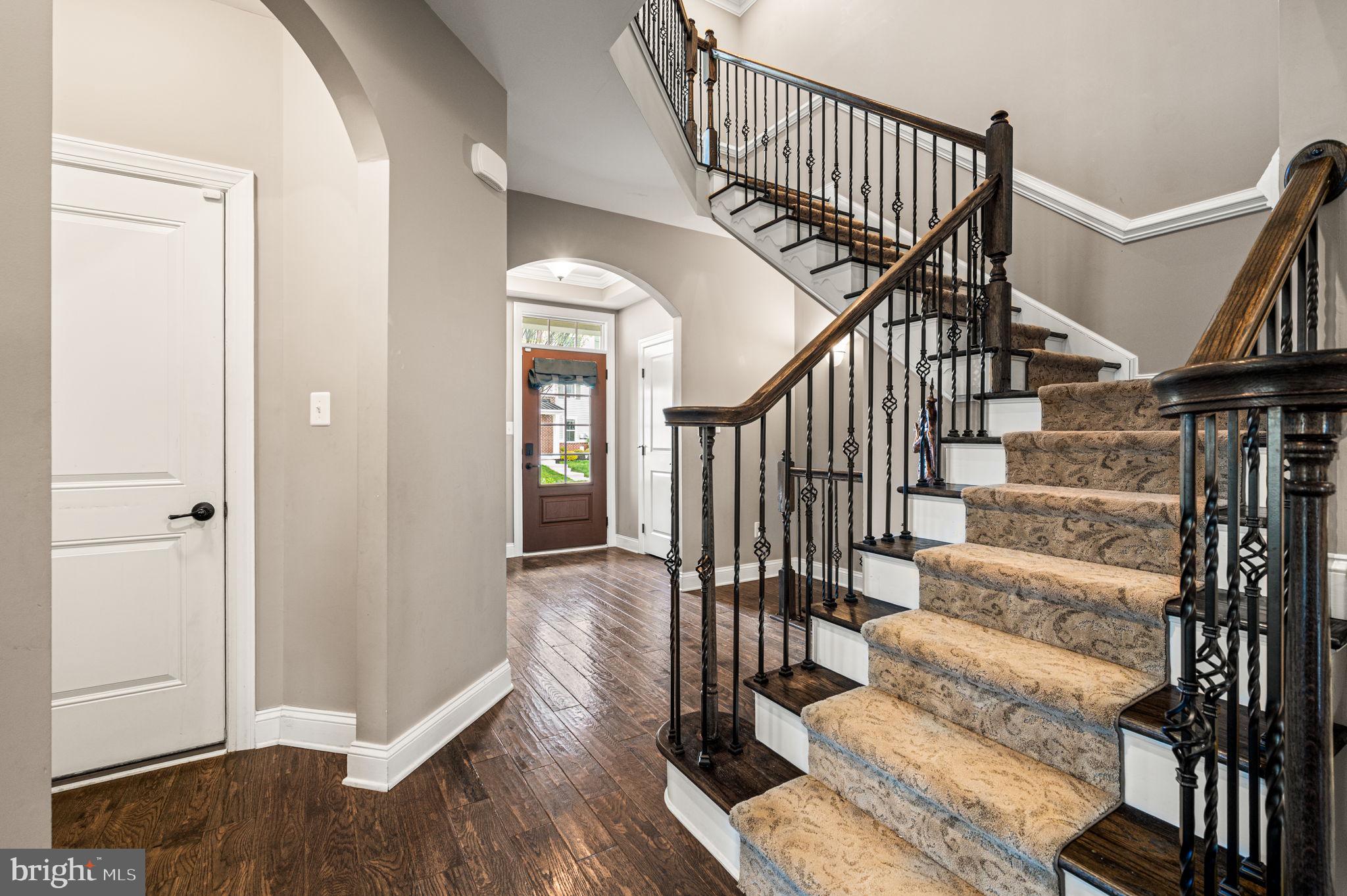 612 Quarry Point Road Malvern, PA 19355 - Photo 8 of 44 a view of entryway and hall with wooden floor