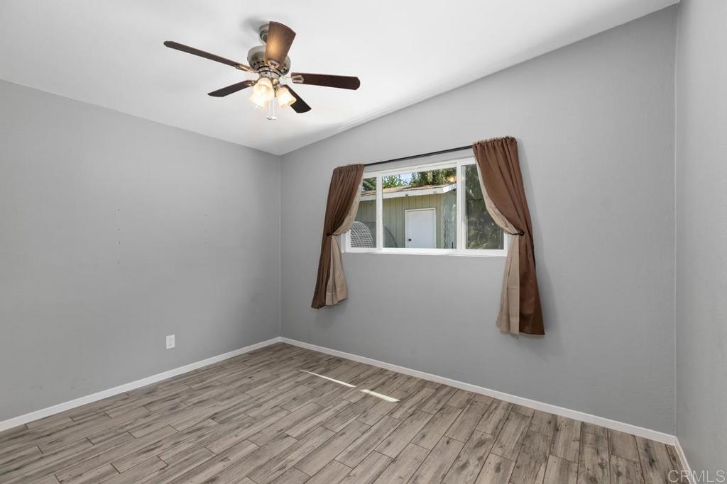 1451 Gowin Street Spring Valley, CA 91977 - Photo 13 of 24 wooden floor in an empty room