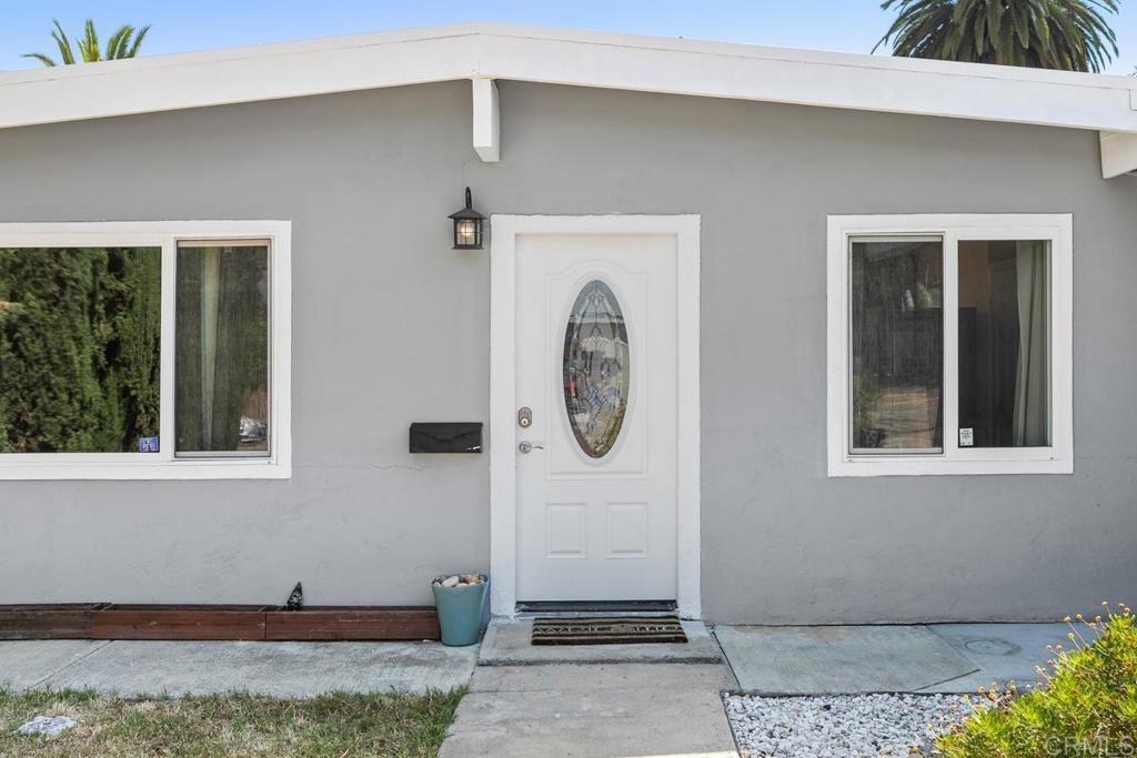 1451 Gowin Street Spring Valley, CA 91977 - Photo 2 of 24 a front view of a house with entryway