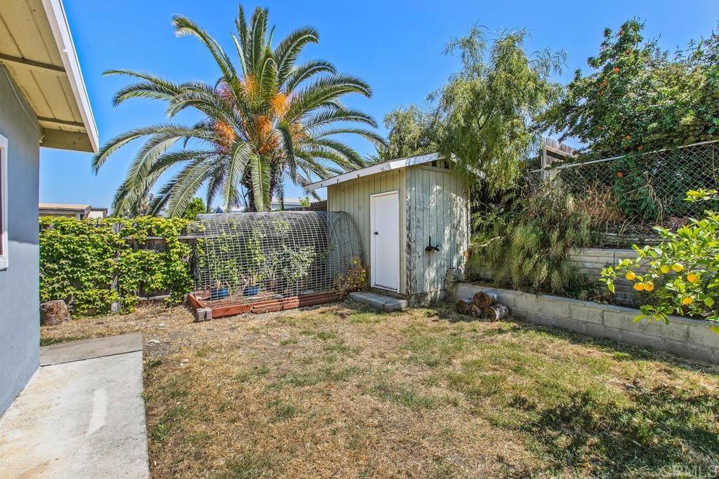 1451 Gowin Street Spring Valley, CA 91977 - Photo 21 of 24 a view of a backyard of a house