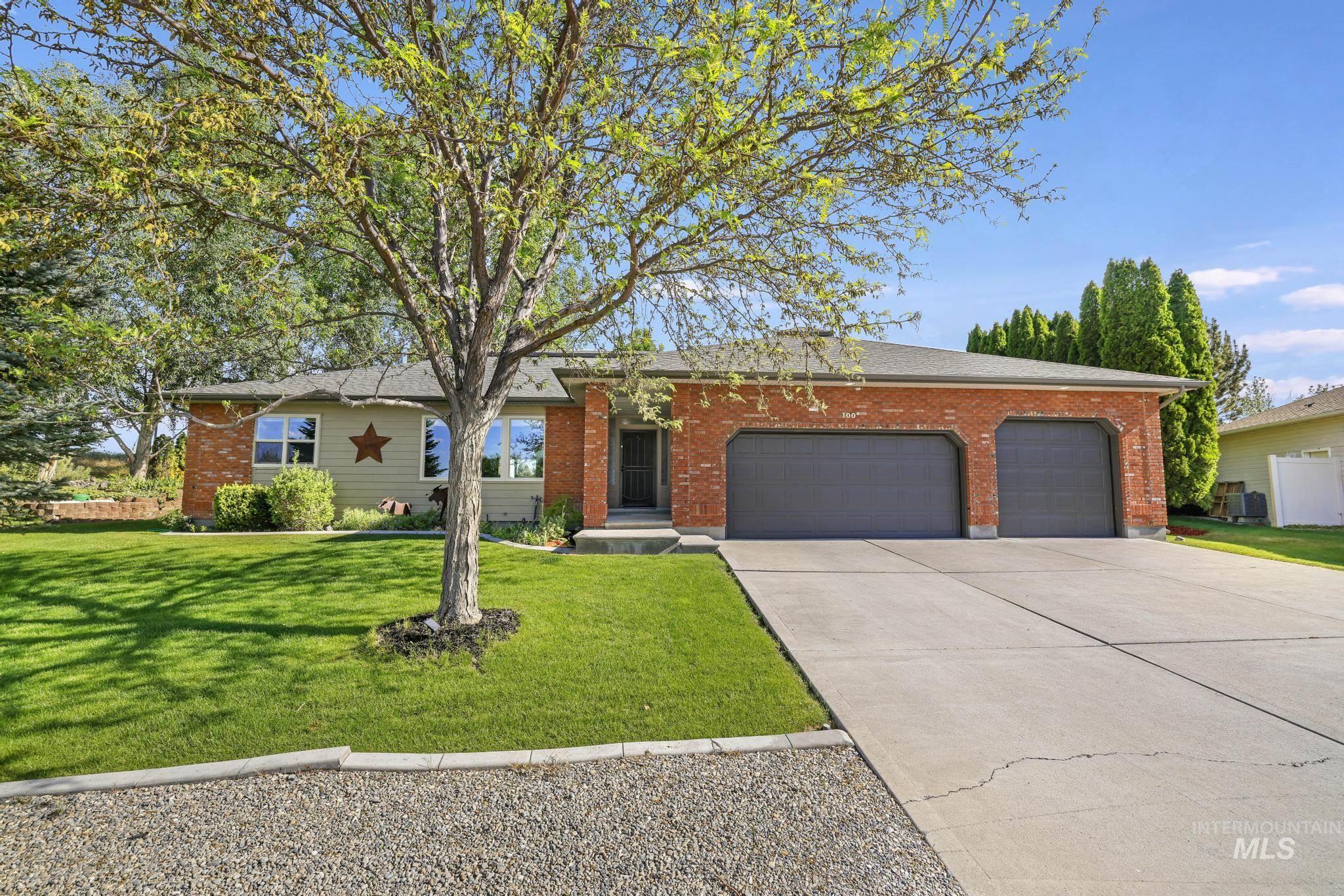 100 Olympic Road Jerome, ID 83338 - Photo 1 of 50 Brick and siding exterior with a dark shingle roof