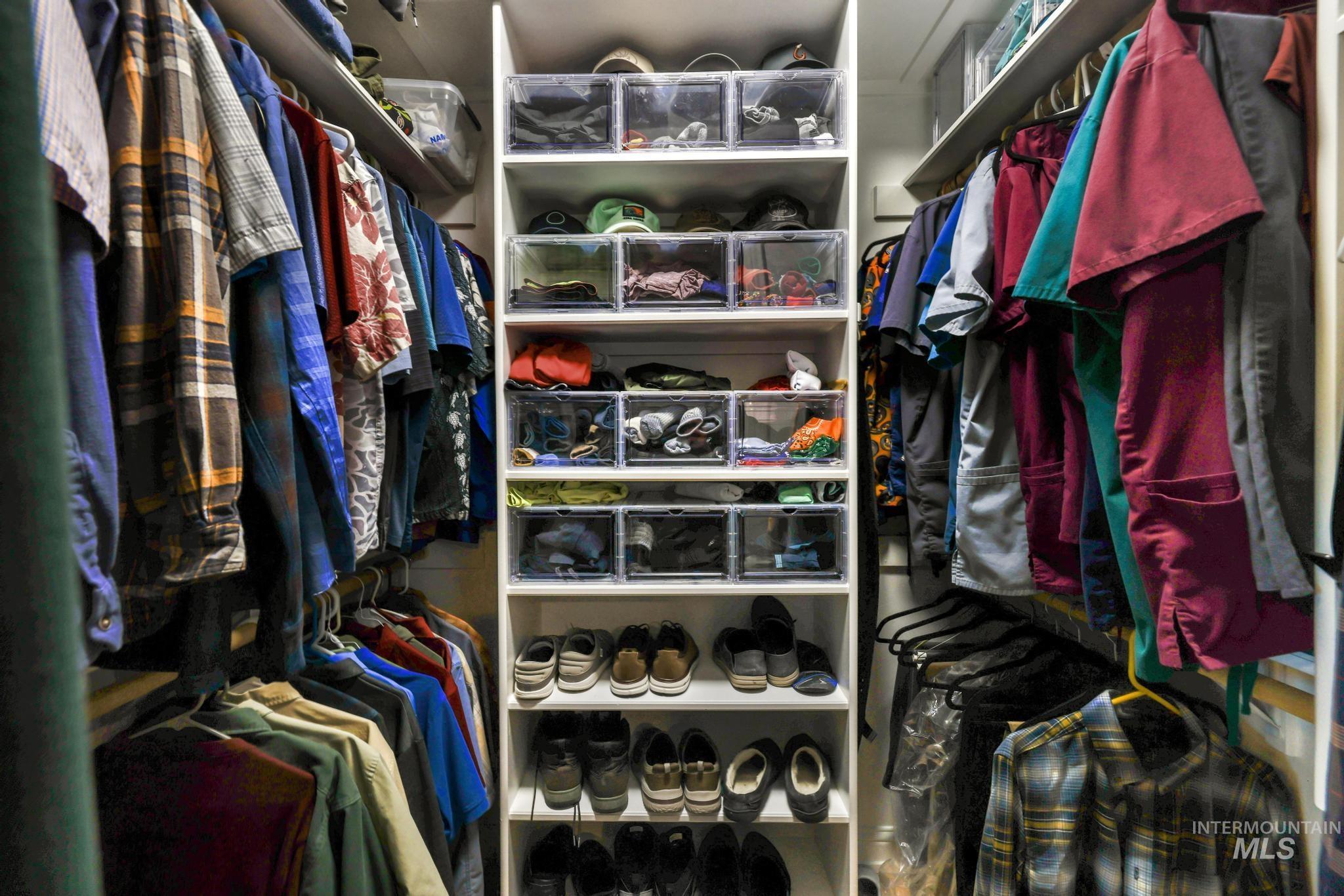 100 Olympic Road Jerome, ID 83338 - Photo 23 of 50 Custom closet system featuring central shelving unit and multiple hanging rods
