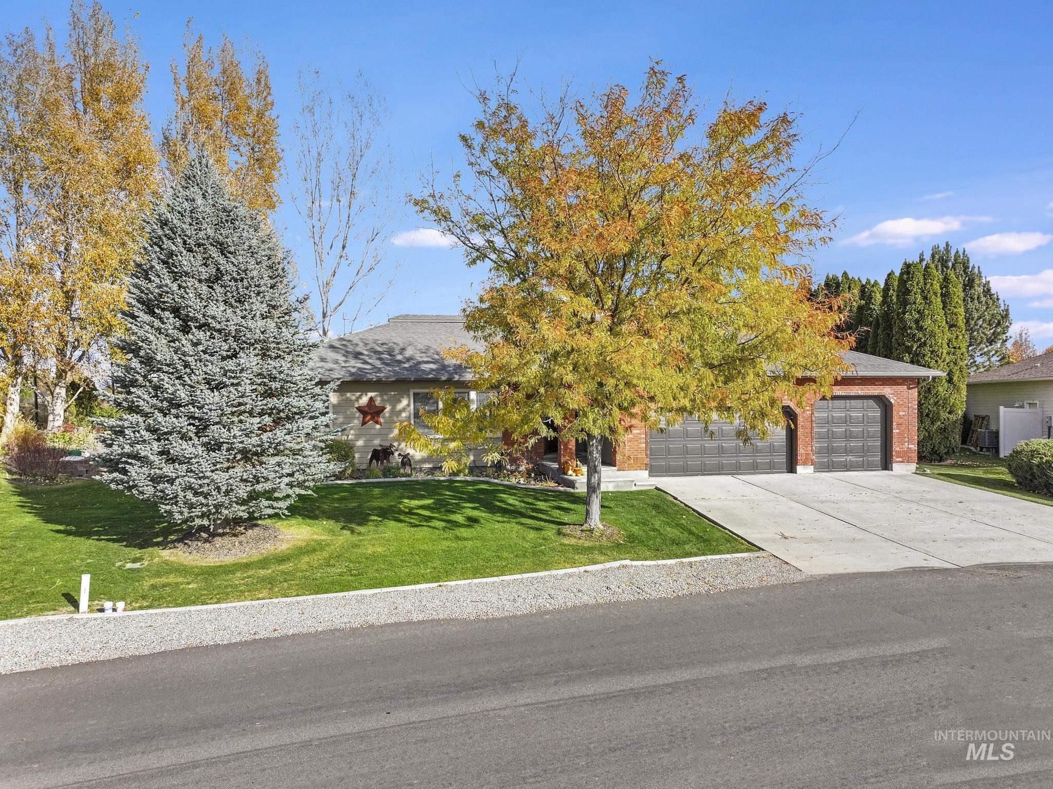 100 Olympic Road Jerome, ID 83338 - Photo 48 of 50 Brick-front residence with a two-car garage