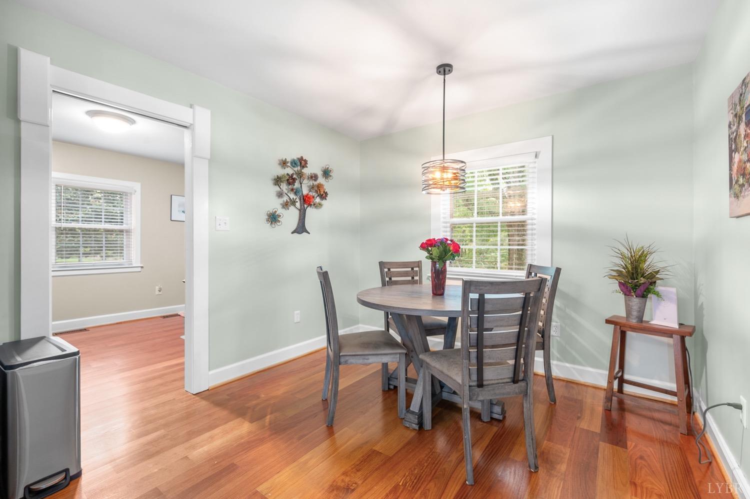 3250 White Road Forest, VA 24551 - Photo 15 of 67 a view of a dining room with furniture window and wooden floor
