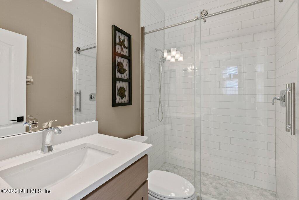 841 Ifield Road St. Augustine, FL 32095 - Photo 33 of 69 a bathroom with a sink toilet and shower