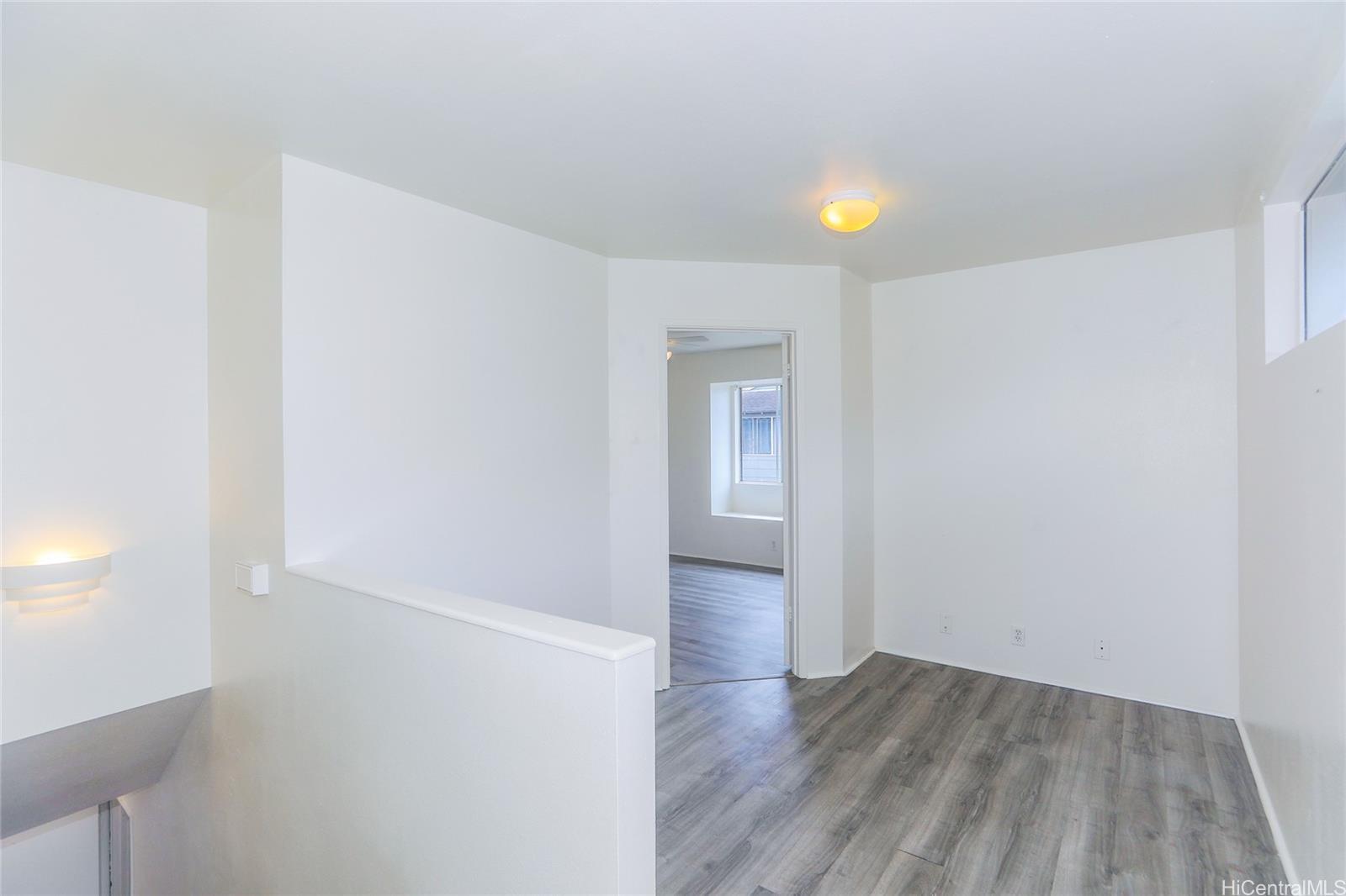 91-1011 Laulauna Street, Unit 136 Ewa Beach, HI 96706 - Photo 9 of 25 a view of empty room