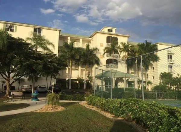 a view of a big yard in front of a building