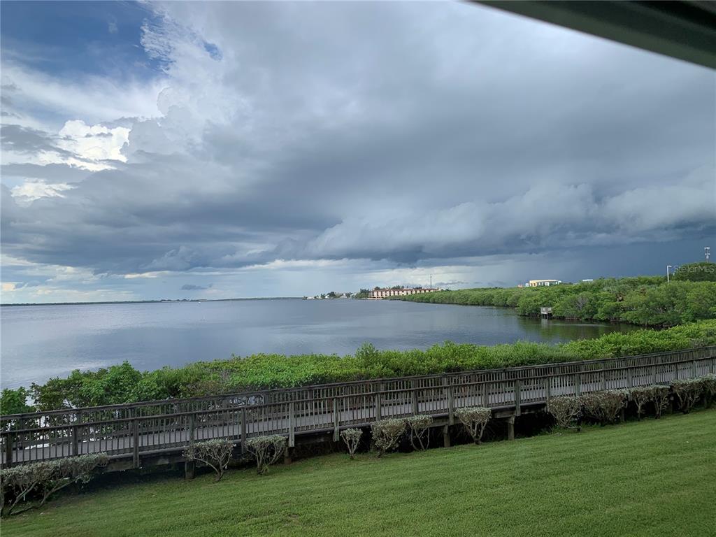 200 Harbor Walk Drive, Unit 321 Punta Gorda, FL 33950 - Photo 22 of 29 a view of a city with green field