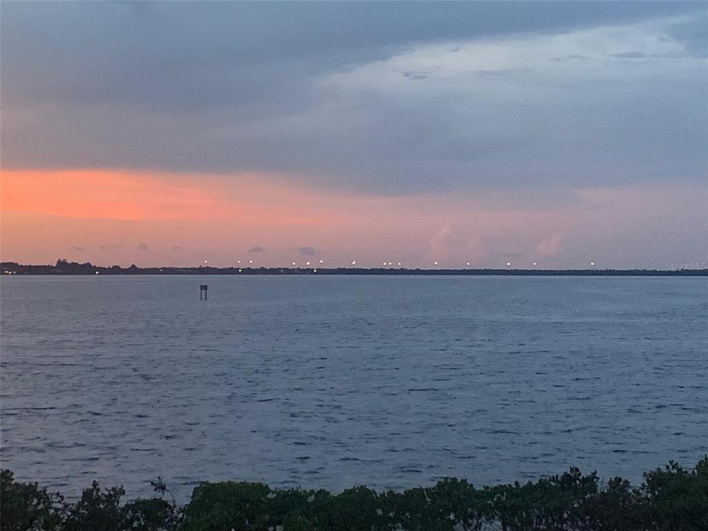 200 Harbor Walk Drive, Unit 321 Punta Gorda, FL 33950 - Photo 25 of 29 a view of an ocean and beach