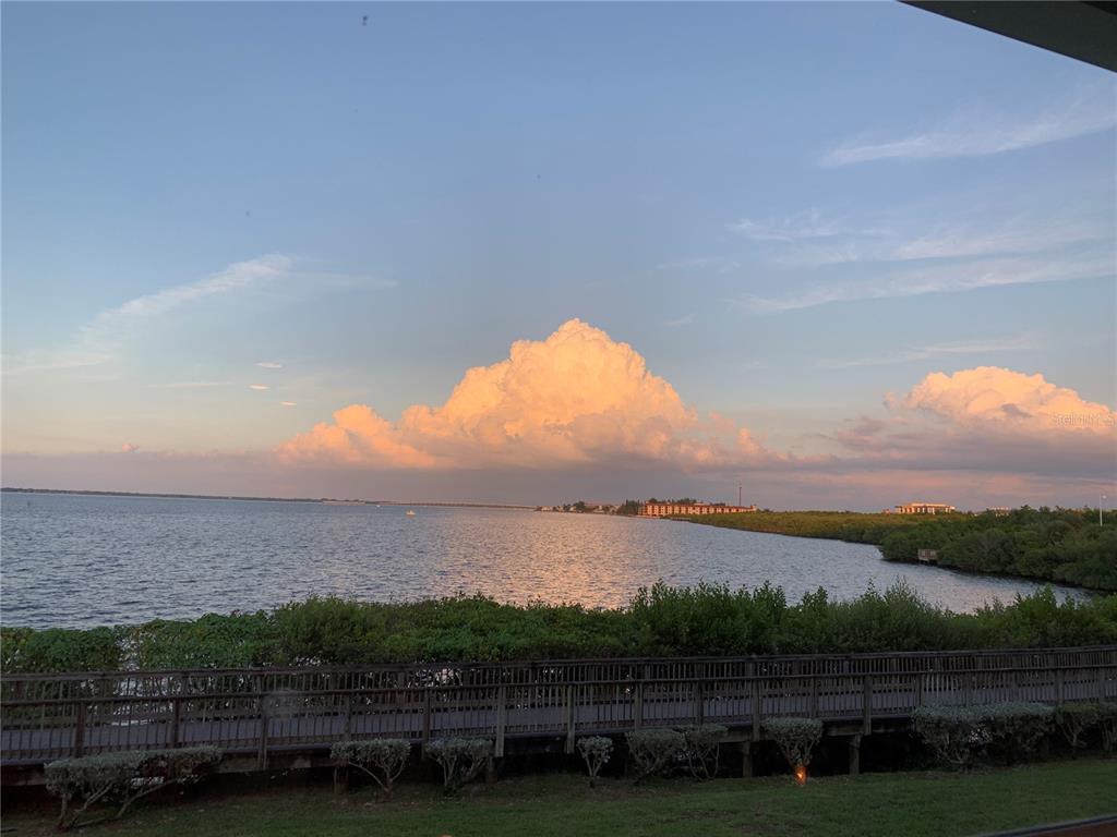 200 Harbor Walk Drive, Unit 321 Punta Gorda, FL 33950 - Photo 26 of 29 a view of lake with houses in background