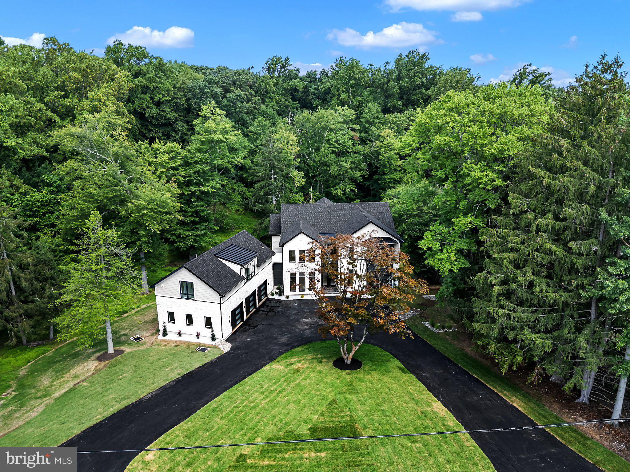 1502 Chinquapin Road Southampton, PA 18966 - Photo 2 of 42 Serene retreat amid lush greenery.