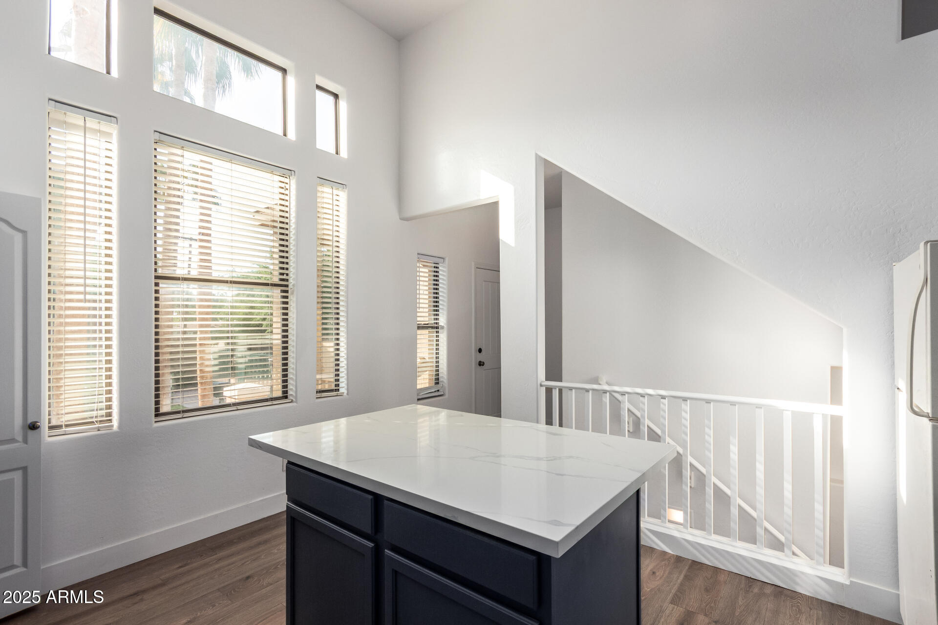 738 South Beck Avenue Tempe, AZ 85281 - Photo 12 of 31 a view of a kitchen that has a sink a window and wooden floor