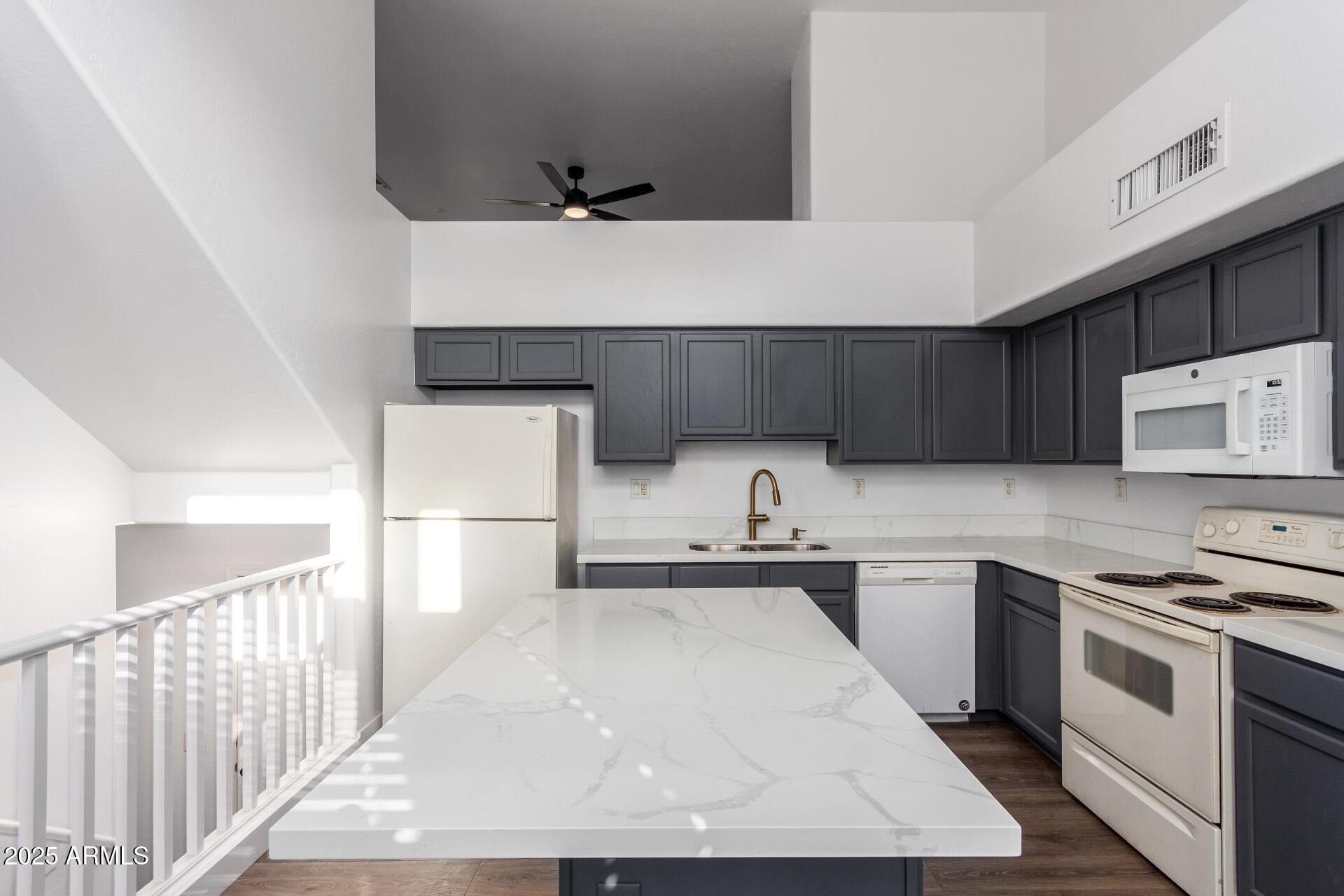 738 South Beck Avenue Tempe, AZ 85281 - Photo 14 of 31 a kitchen with a sink a stove and cabinets