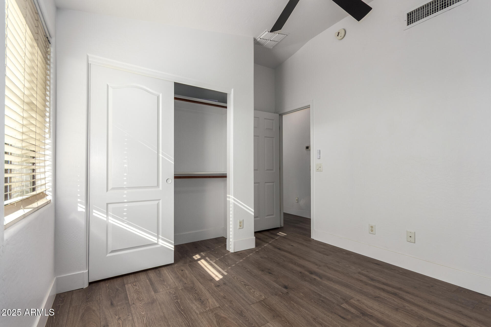 738 South Beck Avenue Tempe, AZ 85281 - Photo 26 of 31 an empty room with wooden floor and windows