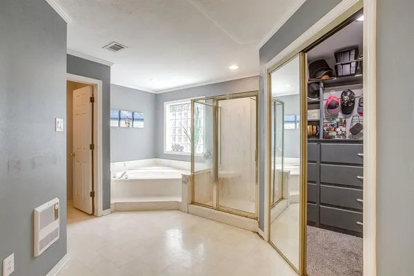 a view of livingroom with furniture and large window