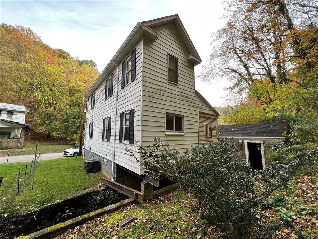 147 Clarks Pike Road Creighton, PA 15030 - Photo 20 of 26 a view of a house with backyard and garden