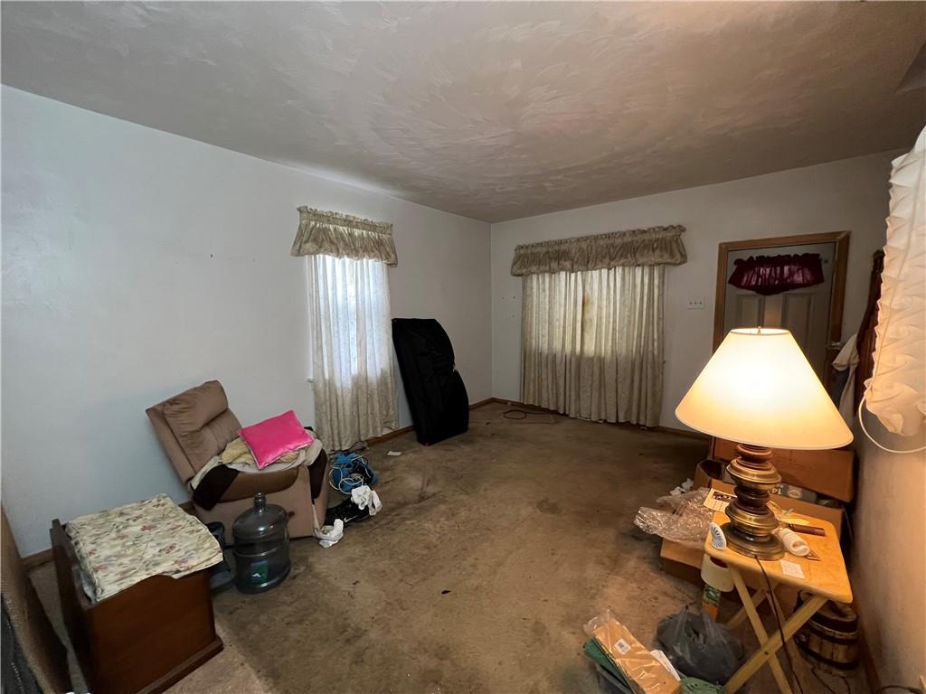 147 Clarks Pike Road Creighton, PA 15030 - Photo 5 of 26 a living room with furniture and a window