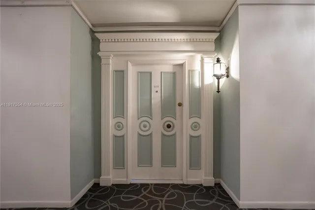 a bed room with a bed and a television