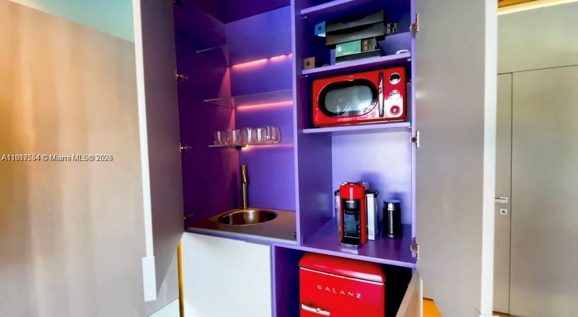 5255 Collins Avenue, Unit 12F Miami Beach, FL 33140 - Photo 38 of 45 a view of utility room