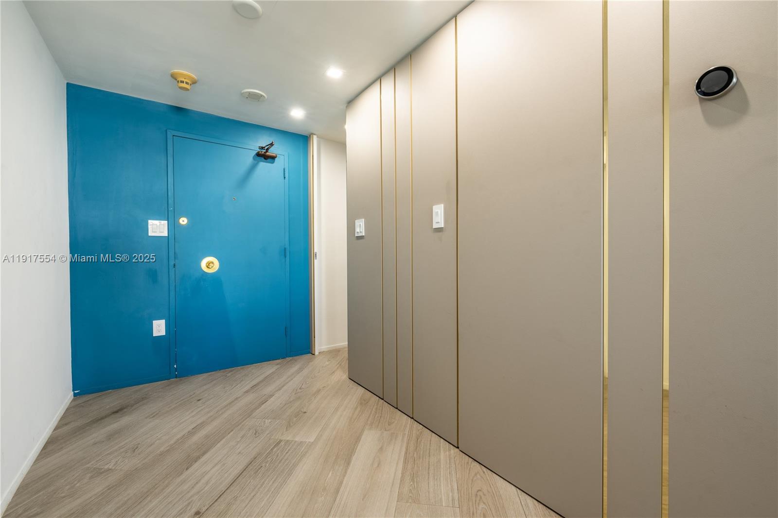 5255 Collins Avenue, Unit 12F Miami Beach, FL 33140 - Photo 5 of 45 a view of a bathroom with shower