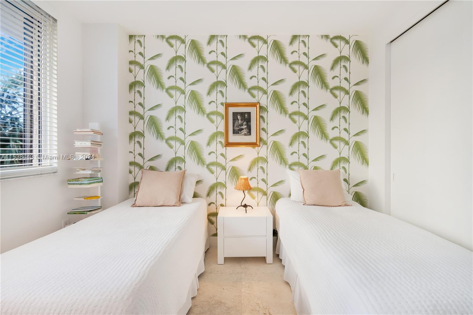 540 Brickell Key Drive, Unit 320 Miami, FL 33131 - Photo 18 of 32 a bedroom with a bed and a window with rug