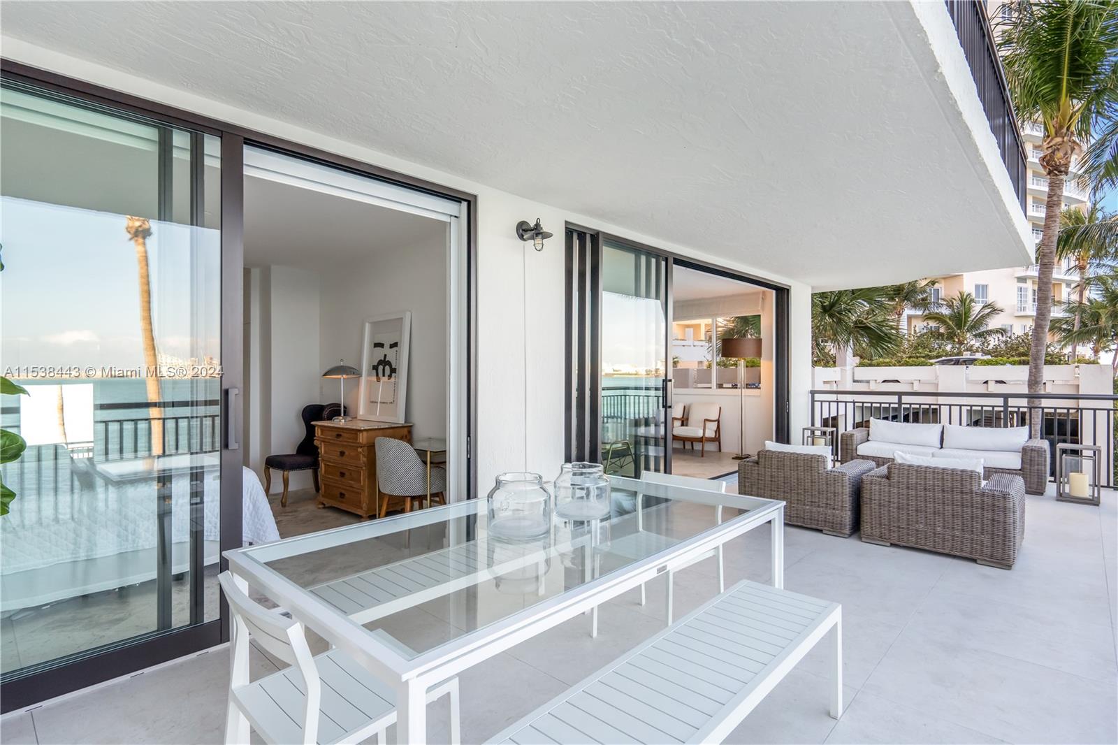 540 Brickell Key Drive, Unit 320 Miami, FL 33131 - Photo 26 of 32 a view of living room with furniture and large windows