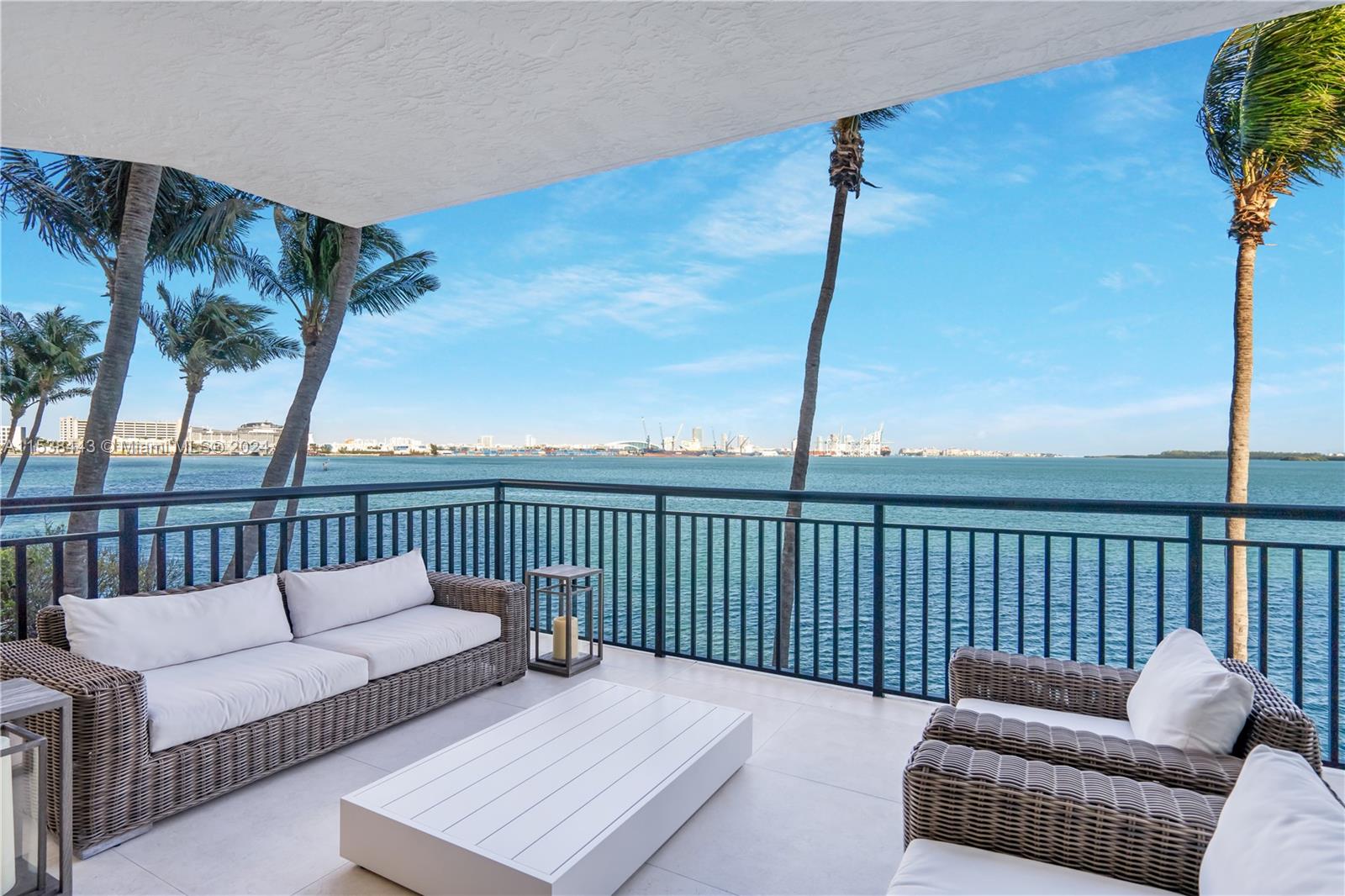 540 Brickell Key Drive, Unit 320 Miami, FL 33131 - Photo 27 of 32 a balcony with furniture
