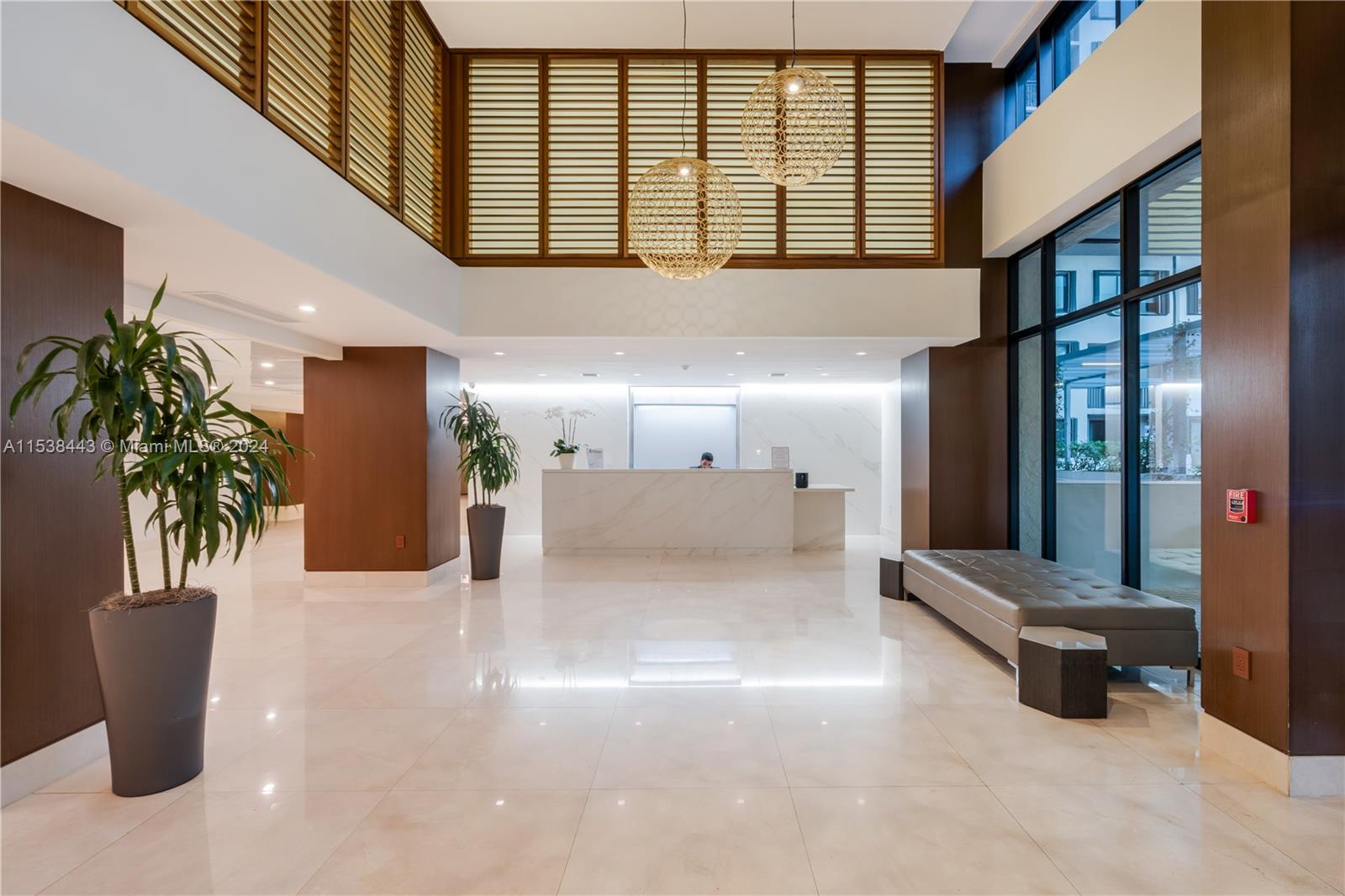 540 Brickell Key Drive, Unit 320 Miami, FL 33131 - Photo 31 of 32 a view of a hallway with seating area